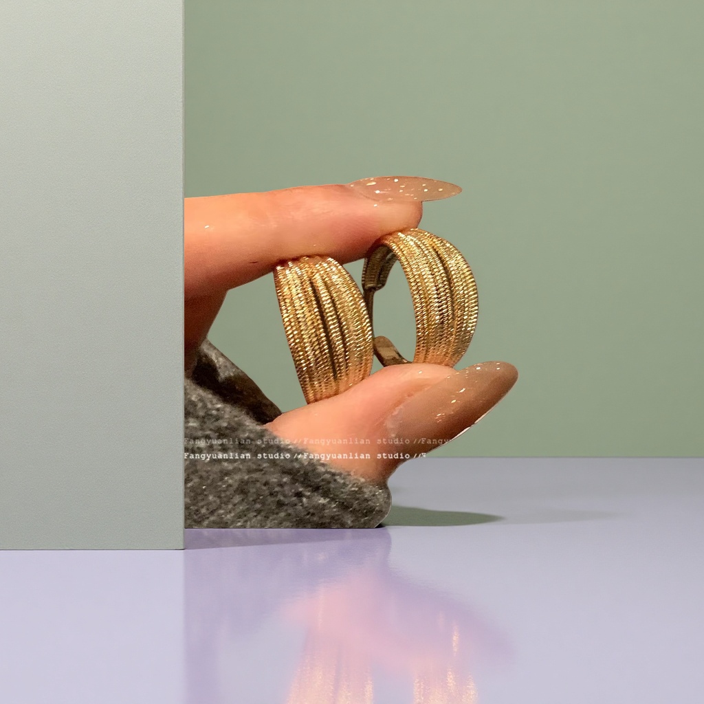 Серьги плетёные золотисто-серебристые оптом из Китая — фотография поставщика