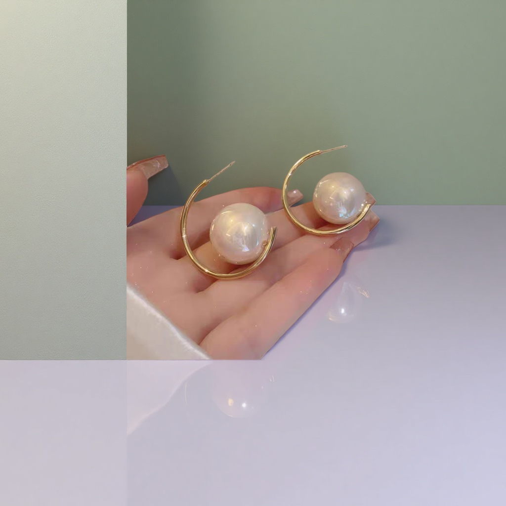 Серьги-кольца золотистые с жемчужиной оптом из Китая — фотография поставщика
