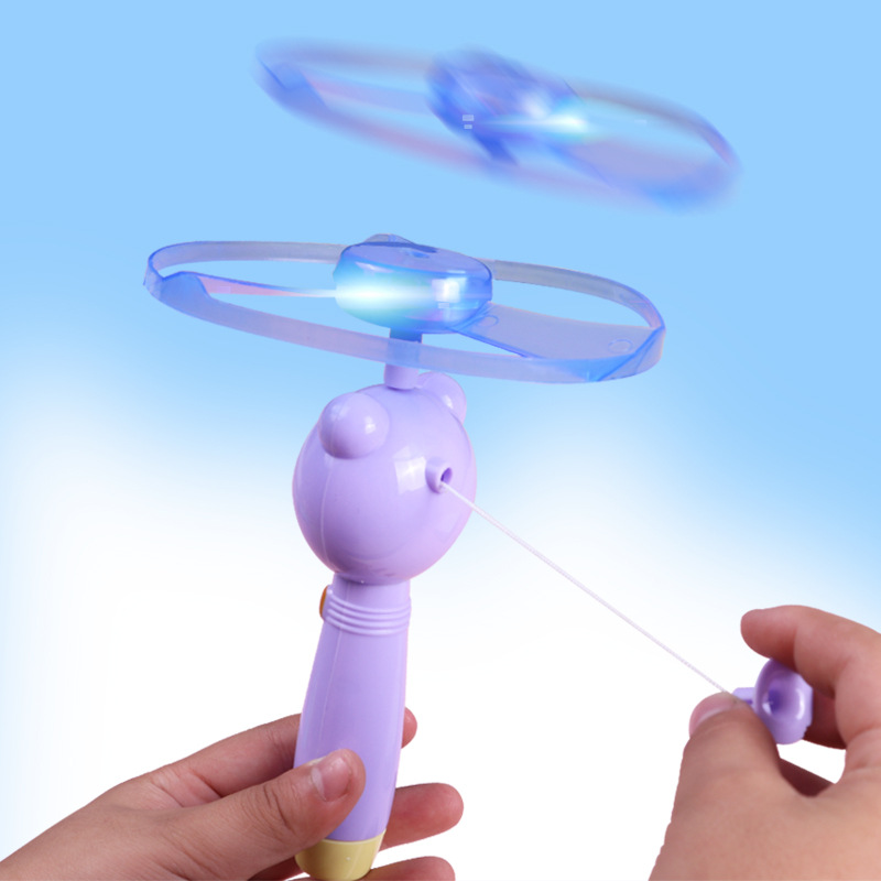 Игрушка летающая светящаяся со шнурком оптом из Китая — фотография 2